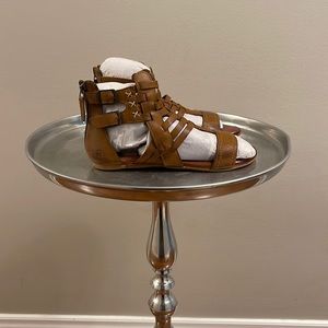 Brand new brown gladiator sandals! Size 6.5  Never worn!!!still packed in paper!
